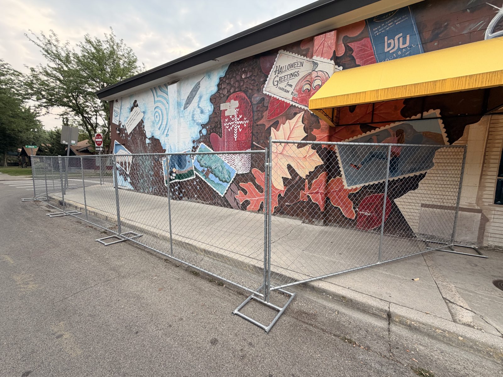 Temporary construction fence around a downtown building