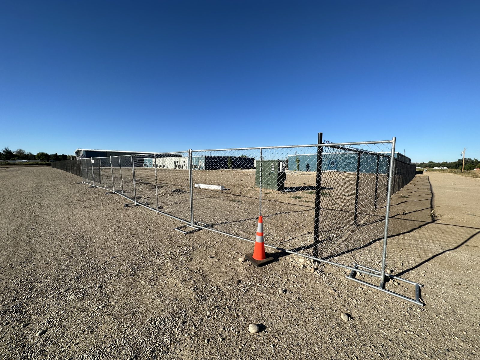 Temporary fence panels on a job site lot